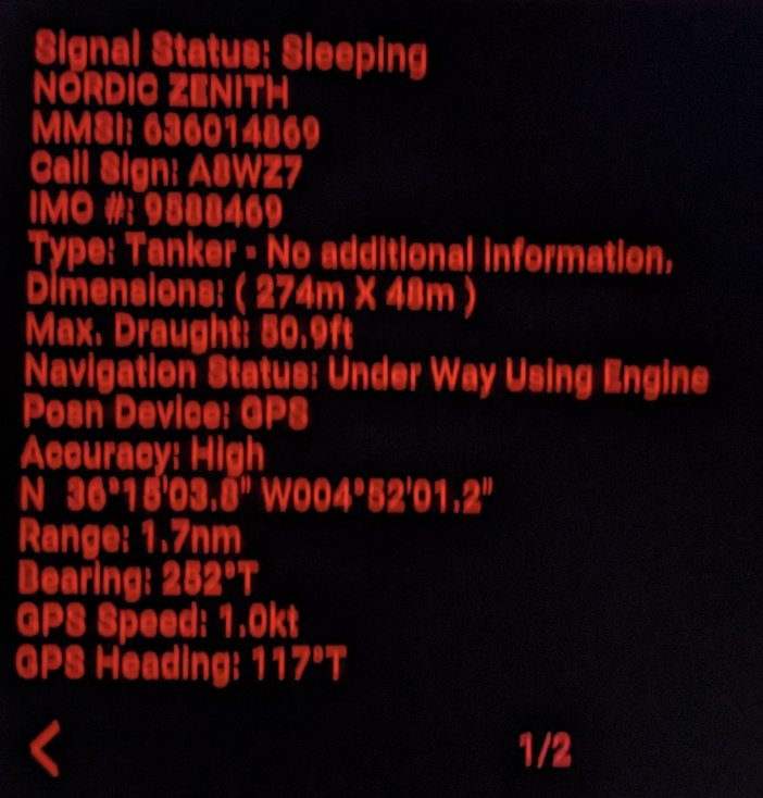 Image of the GPS screen displaying  details of a commercial vessel in. text form.